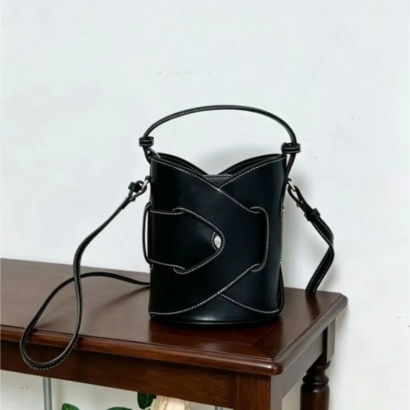 BOLSO BUCKET TRENZADO MINIMAL