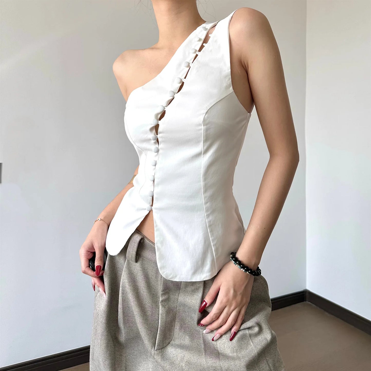 TOP ASYMMETRIC ÉLITE