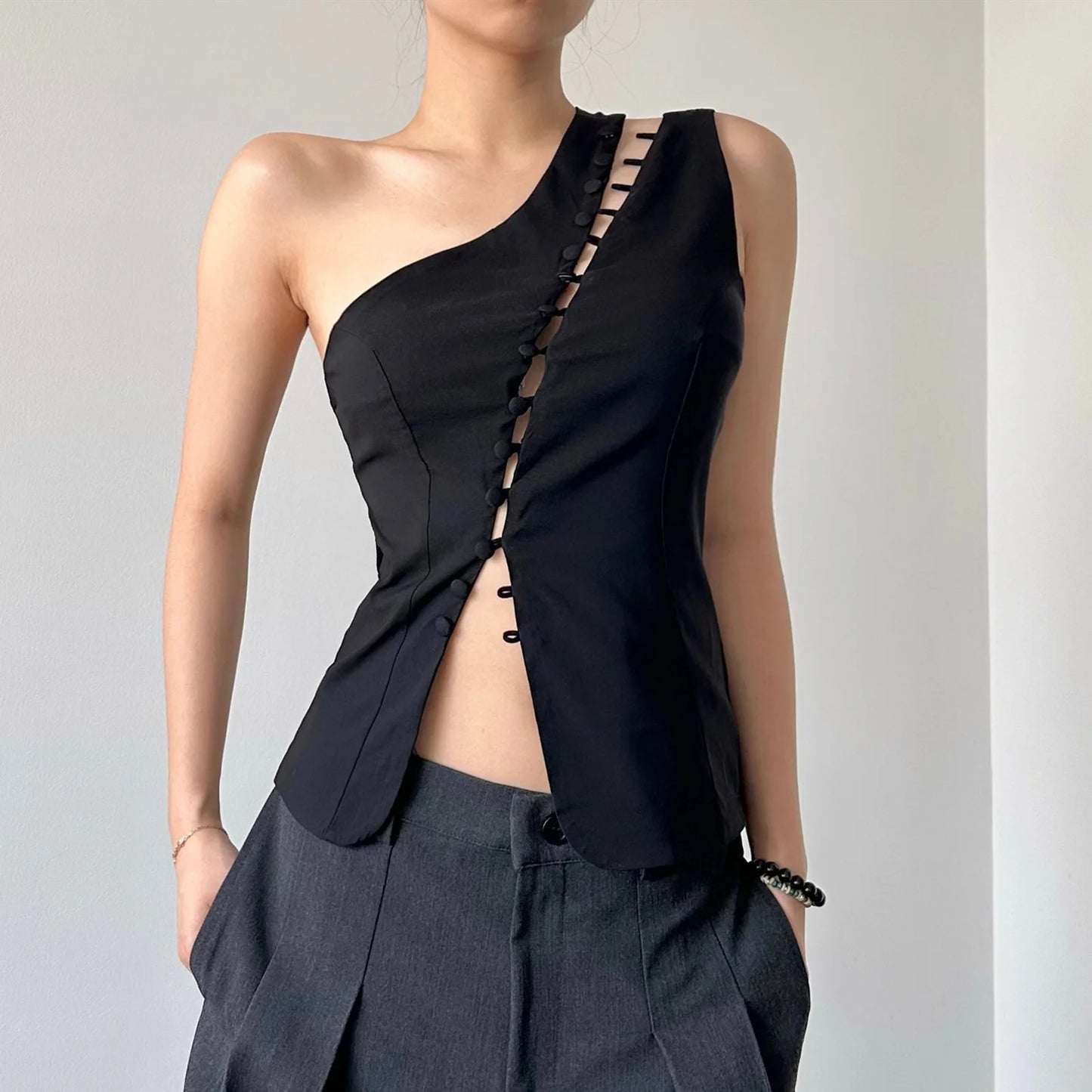 TOP ASYMMETRIC ÉLITE