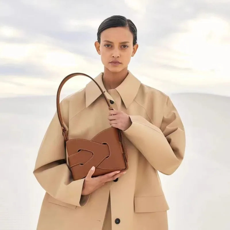 BOLSO BUCKET TRENZADO MINIMAL